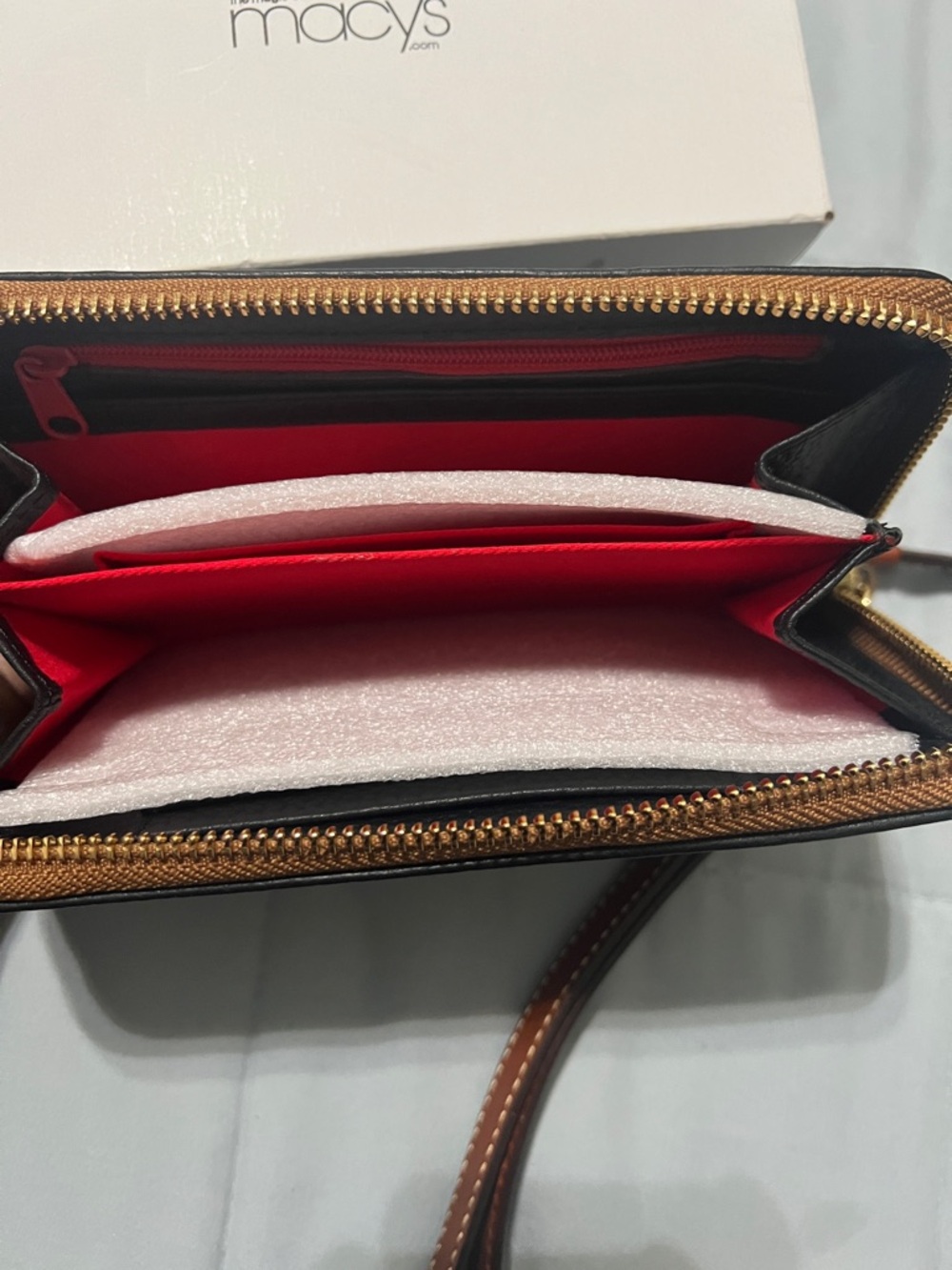 Dooney & Bourke Black Pebbled Leather Wristlet with Tan Trim - Picture 2 of 3